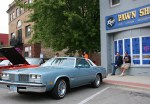 Car Cruise, #51 1977 Olds Cutlass Supreme in front of pawn&nbsp;shop