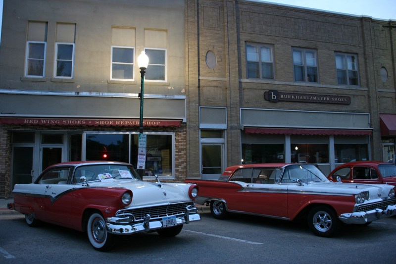 As day faded into darkness, I photographed these Fords parked outside on the Faribault's oldest family-run businesses, Burkhartzmeyer Shoes.