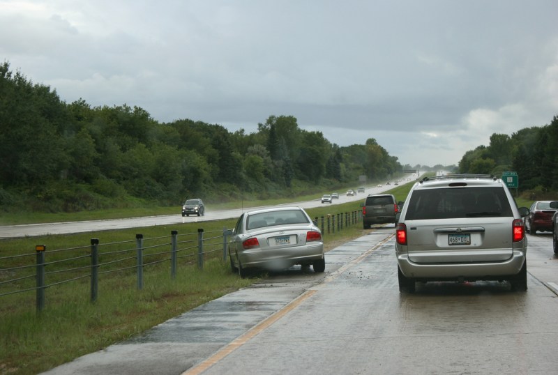Shortly thereafter, we came upon a weather related crash. The entire front of this car was smashed. Traffic snarled, apparently for a crash further away. That was cleared by the time we arrived.