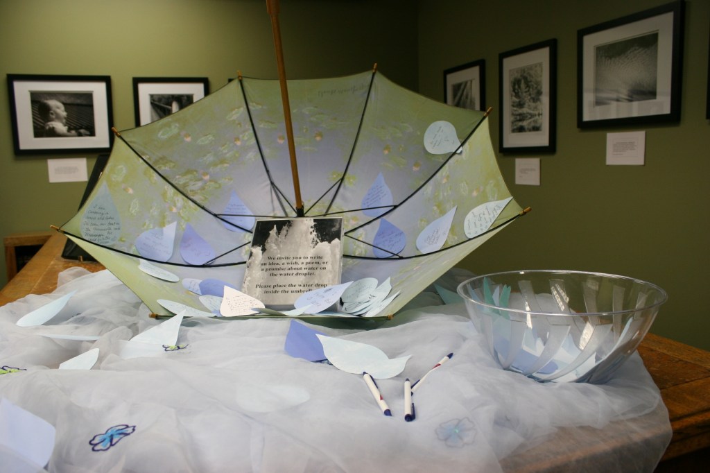 In a side room, you'll find Kay Herbst Helms' photo exhibit, "Water Rights?" In the table display, visitors are asked to pen their thoughts on water.