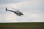 Helicopter spraying, 109 over corn&nbsp;field