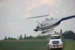 Helicopter spraying, 126 taking off from&nbsp;truck