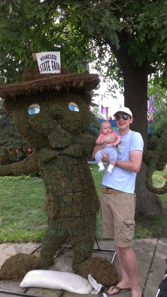 Isabelle's first official Minnesota State Fair photo, taken here with her daddy (my son-in-law), Marc. Photo by Amber.