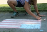 Vietnam Wall Memorial processional, #4 drawing flag with&nbsp;chalk