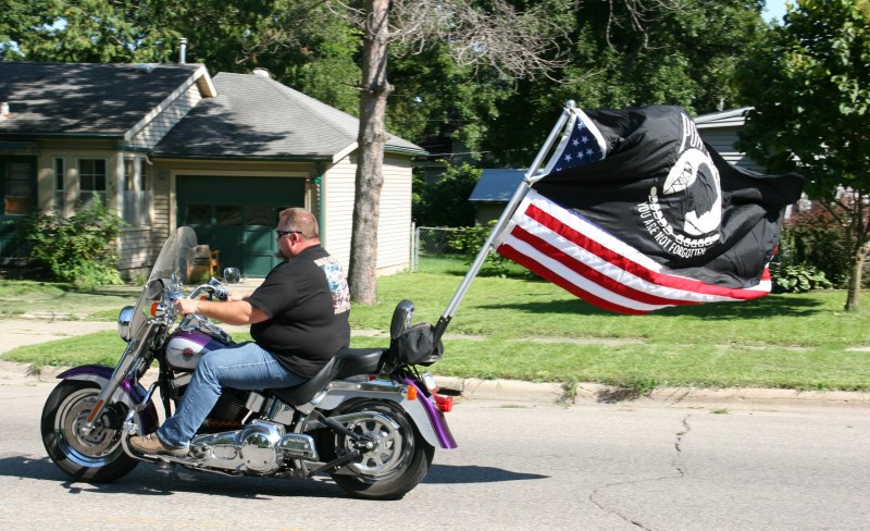 Vietnam Wall Memorial processional, #46 biker & POW flag