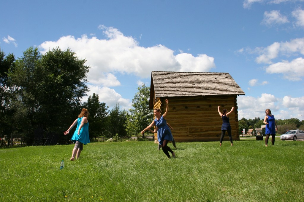 The southern Minnesota based Rural Route Dance Ensemble performs Sunday afternoon next to a log cabin at the History Site Treaty Center along Highway 169 in St. Peter.