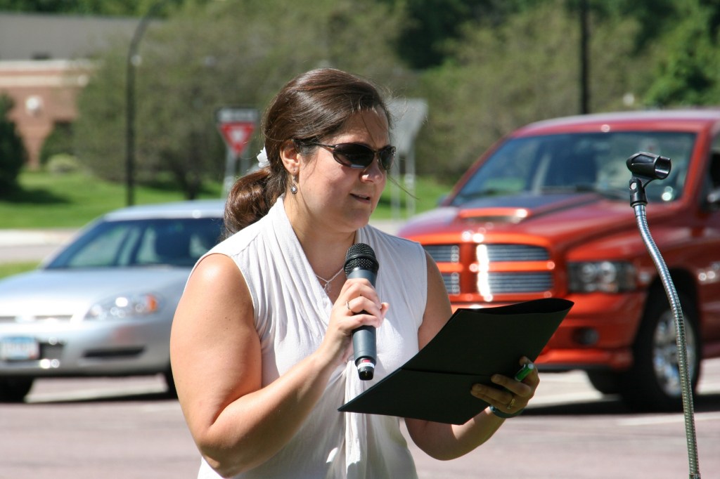 League of Minnesota Poets President Christina Flaugher reads her poetry. John Hurd and Susan Stevens Chambers also read their poetry.