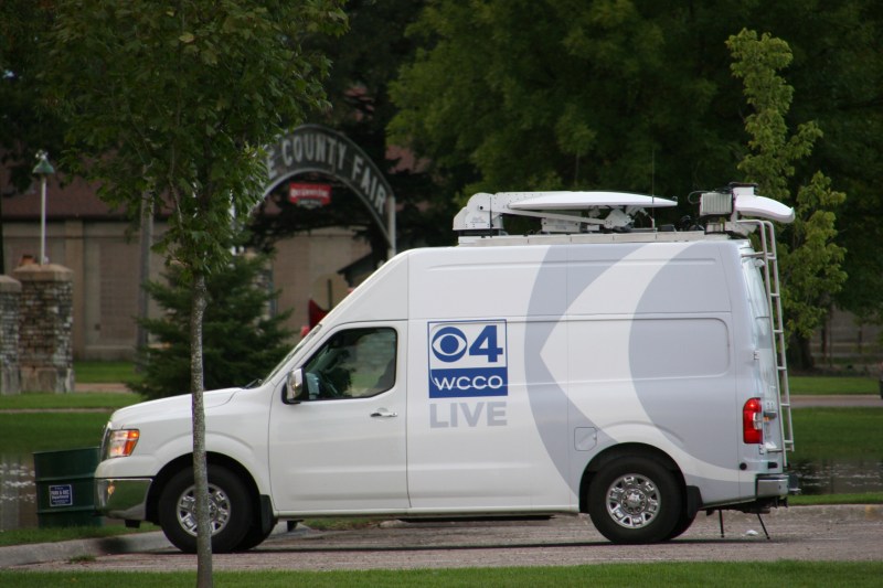 This Twin Cities news crew, parked near the Rice County Fairgrounds entry Thursday evening, was filming at the Faribault Woolen Mill.