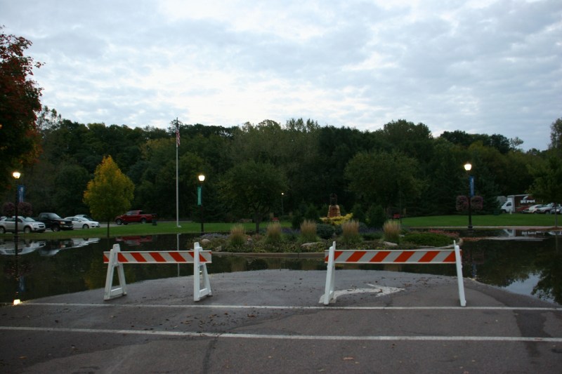 A flooded street by Heritage Park near the Straight river close to downtown.