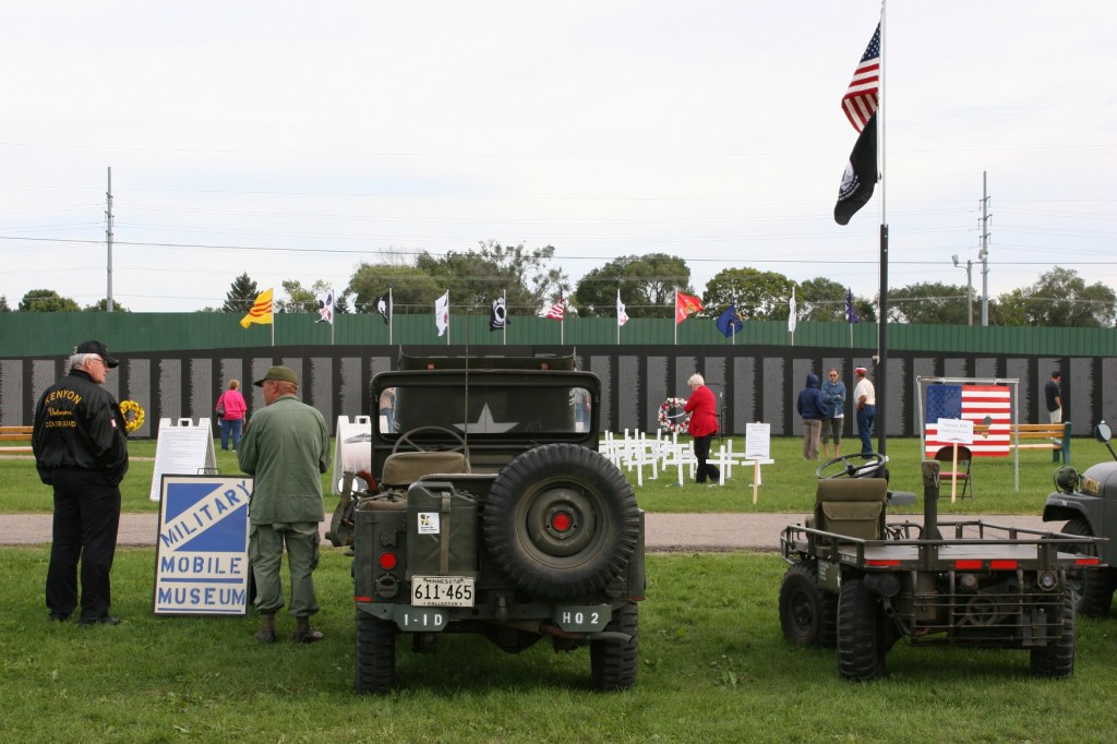 An overview of the Traveling Wall (background) and the military equipment displayed recently at the Rice County Fairgrounds.