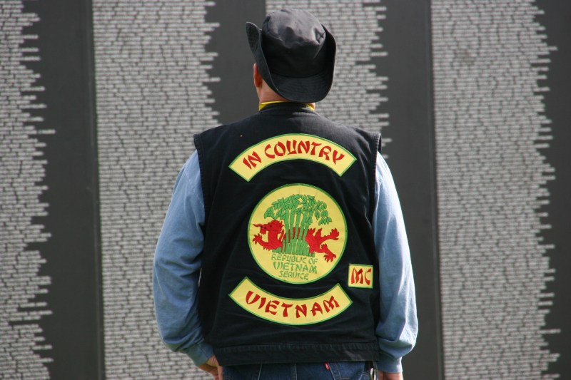 A Vietnam veteran views the traveling wall on Saturday afternoon.