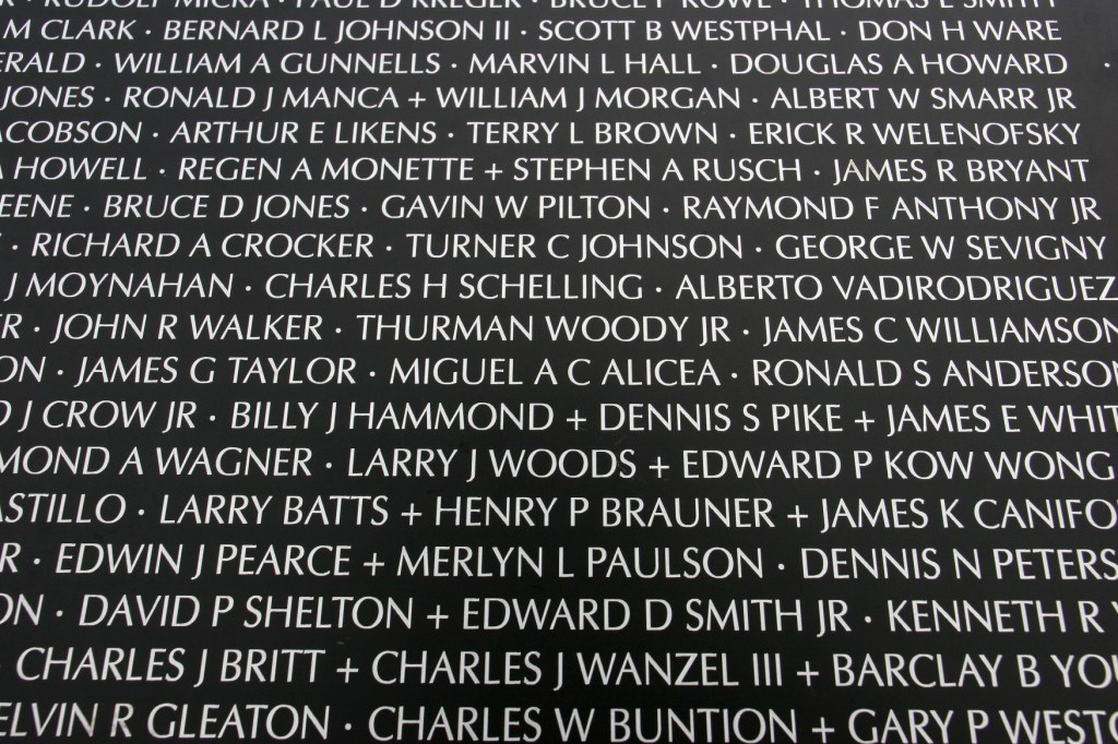 A close-up of names on the Traveling Vietnam Memorial Wall.