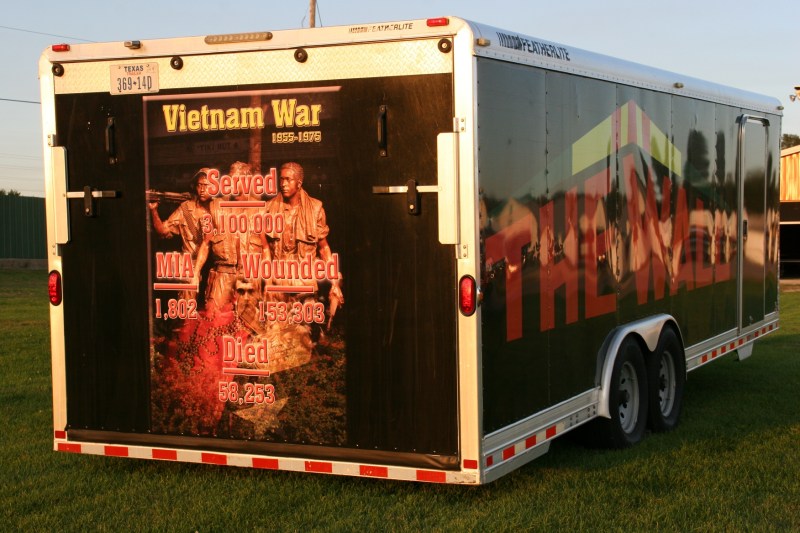 The back of the trailer carrying the wall.