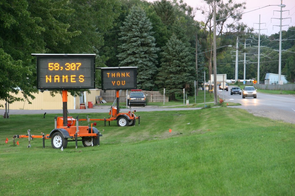 These electronic signs are stationed by the Rice County Highway Department building along Minnesota State Highway 3 across from the fairgrounds. They welcomed Vietnam veterans during Wednesday's processional.
