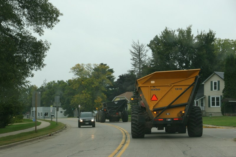 Stuck behind farm equipment along Highway 21.