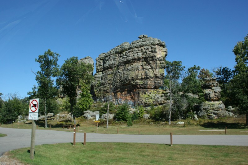 The natural attraction, Castle Rock, juts up from the landscape.