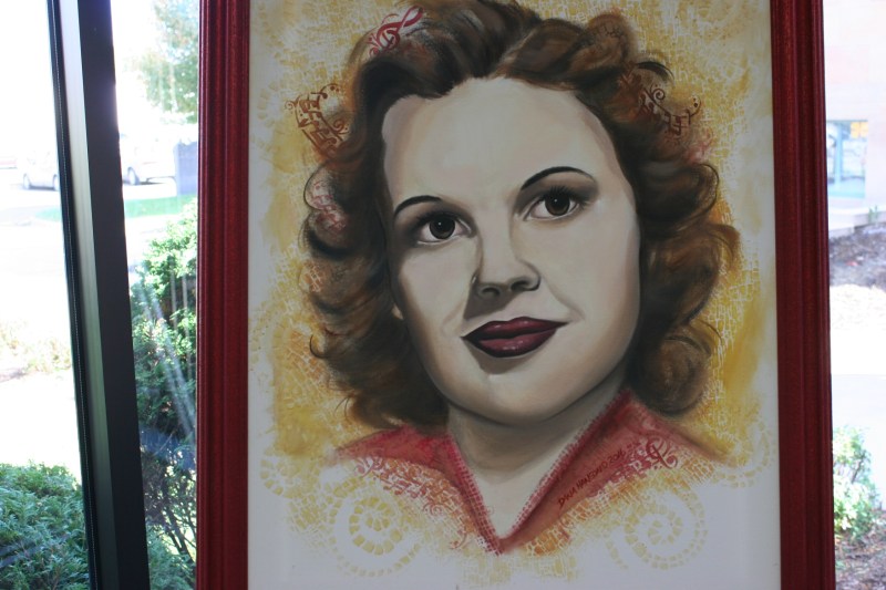 Dana Hanson also painted this portrait of Judy Garland, who was inducted in to the Minnesota Music Hall of Fame in 1991. Judy was born as Frances Ethel Gumm in Grand Rapids, Minnesota, and starred in "The Wizard of Oz."