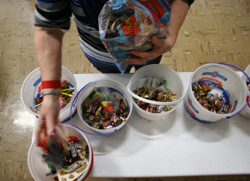 Sorting candy for game prizes. There will also be non-candy prizes.