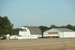 harvest-59-grain-truck-white-buildings-on-farm-site