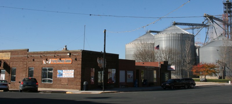 A snippet of downtown Hayfield looking from The Flying Monkey Saloon toward the post office and grain elevator.