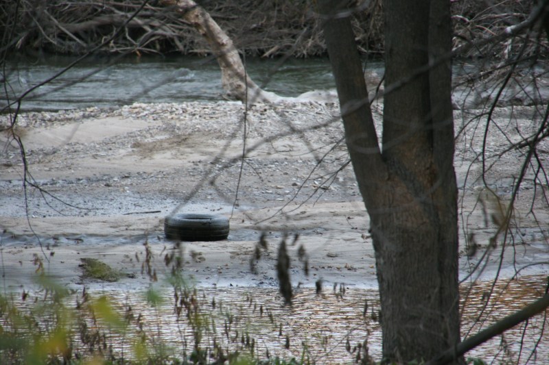 trail-8-tire-by-river