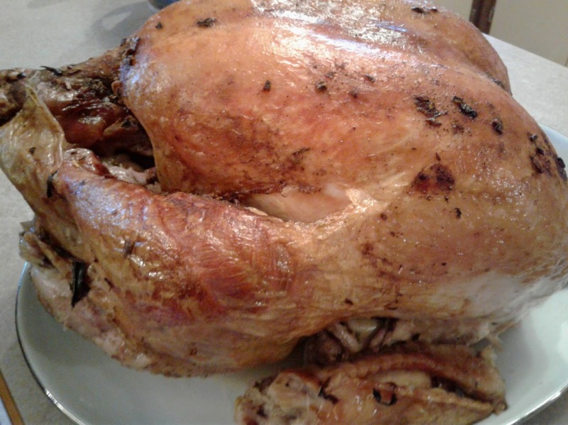 Hundreds of pounds of turkey are baked along with hundreds of pounds of potatoes peeled...
