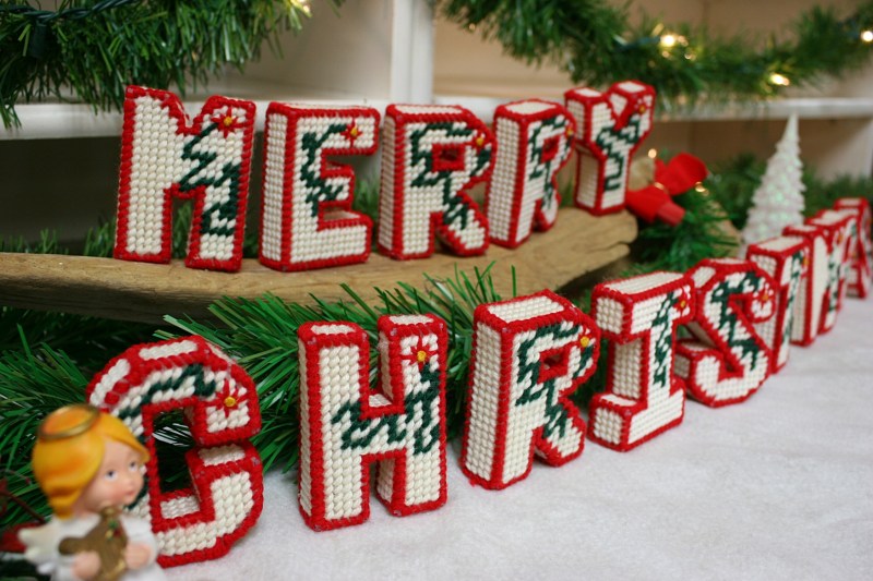 Christmas decorations grace a shelving unit.