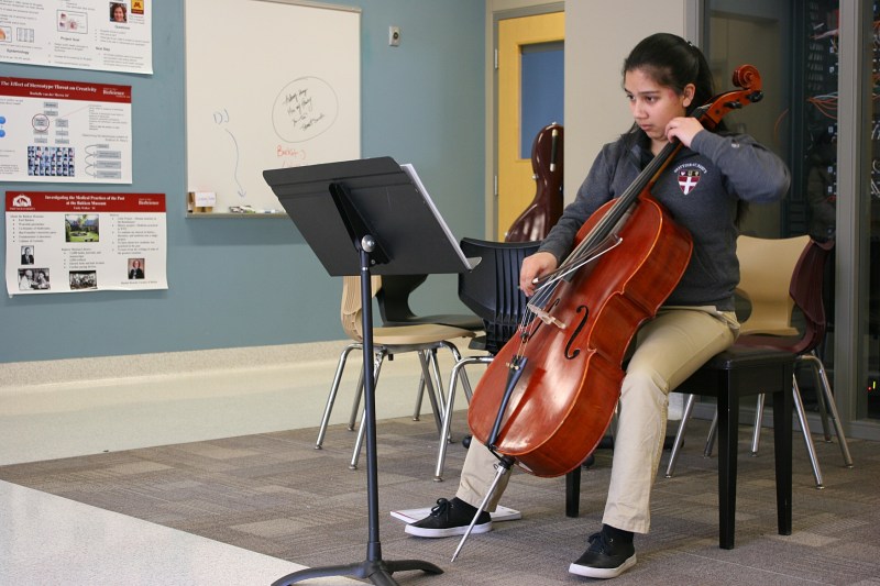 A lone musician performs.