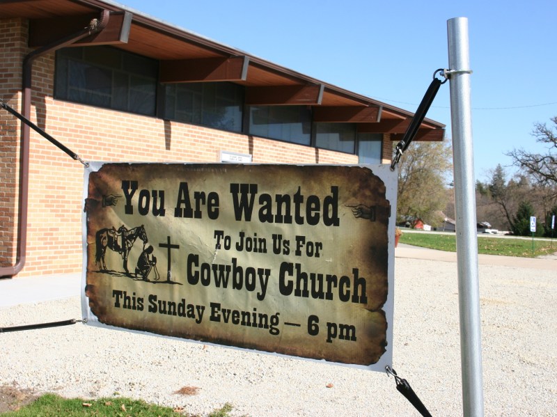 cowboy-church-96-sign-with-church-in-background