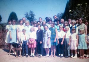 Missionary children at ELM House (Evangelical Lutheran Mission House) in Nigeria. Missionary children lived in the hostel so they could attend boarding school in Jos, Nigeria. The Rev. Paul and Margaret Griebel served as houseparents. Three of their children, including Kirk, are pictured in this group photo.