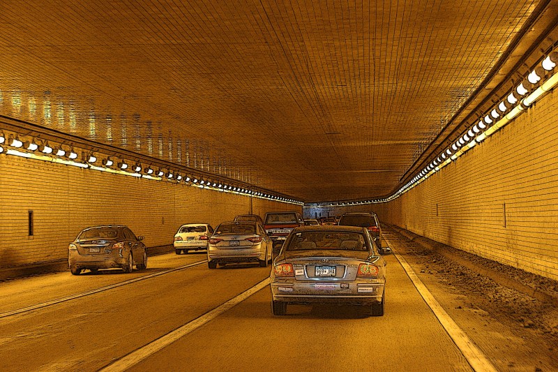 Passing through the Lowry Tunnels always seems visually surreal to me, like driving through a video game.