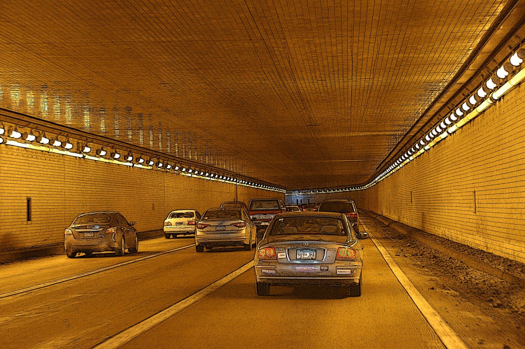 Passing through the Lowry Tunnels always seems visually surreal to me, like driving through a video game.