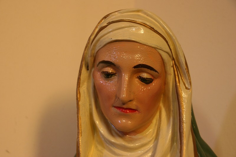 Statues like this one of Mary fill the church.