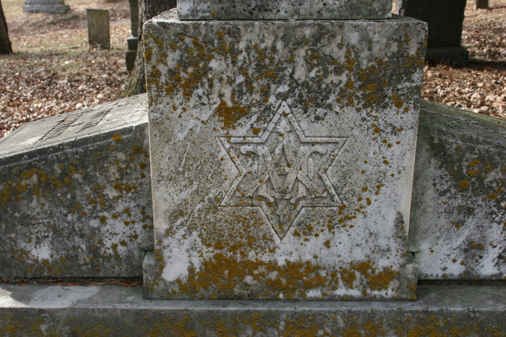 I've visited many rural Minnesota cemeteries. This is the first Star of David I've found on a tombstone.