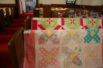 Church fest, quilts #47 pinkish quilts