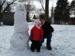 Izzy 6 by snowman with&nbsp;grandpa