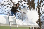 Shoveling snow off roof, #96 front view&nbsp;throwing