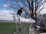 Shoveling snow off&nbsp;roof
