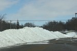 Snowy Faribault, #111 snow piled in hs parking&nbsp;lot