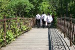 Thai gardens, #146 guys walking&nbsp;to