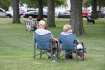 Concerts in the park, #9535 couple with rope around&nbsp;chairs